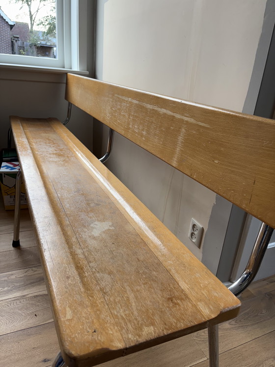 Image 1 of Houten bank met stalen frame