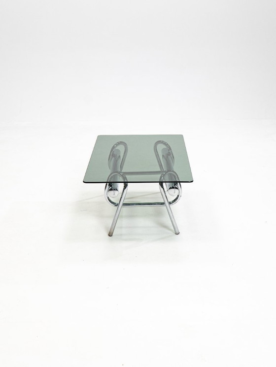 Image 1 of Tavolino da caffè scultoreo cromato con nodo degli anni '70