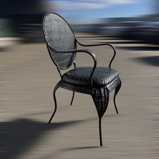 Vintage zwarte rieten/metalen stoel