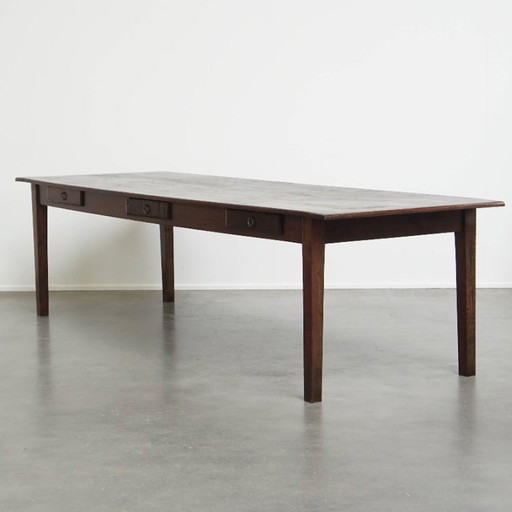 Large antique French farmhouse dining table with a patina