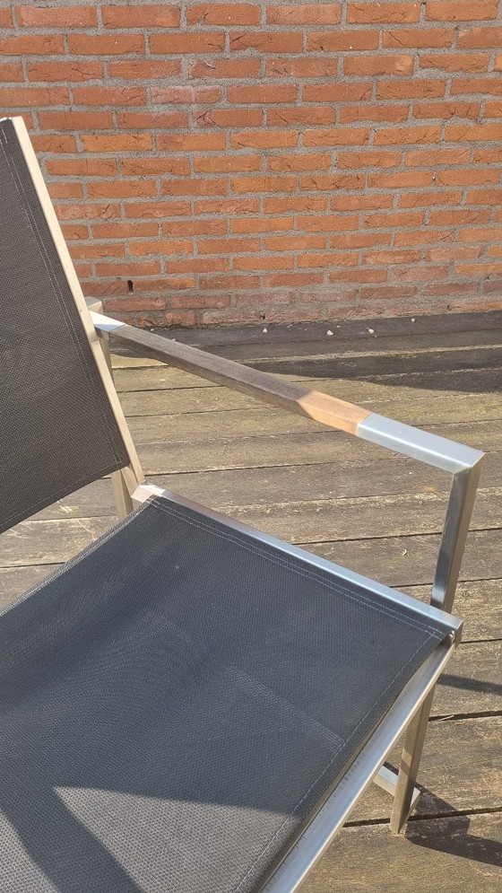 Image 1 of Set da giardino con tavolo in teak e 4 sedie in acciaio inox, realizzato in teak e textilene.