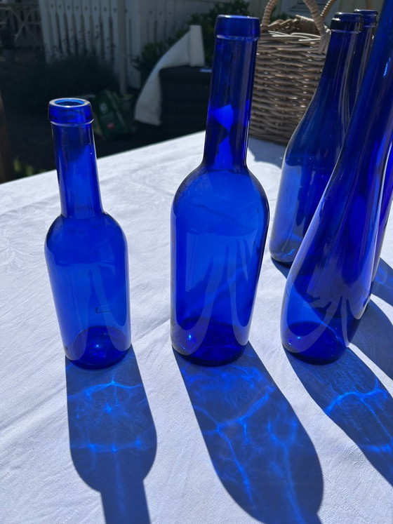 Image 1 of Set van 6 kobaltblauwe glazen flessen/vazen/vintage blauwe decoraties