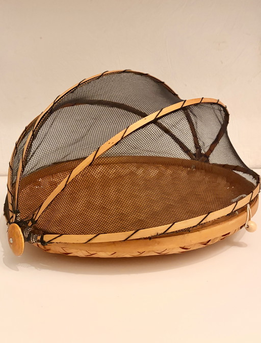 Voedselafdekking van riet met muggennet – vintage stijl