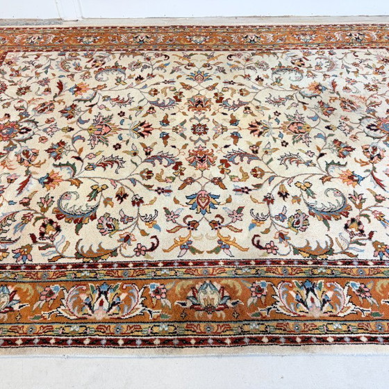 Image 1 of Large vintage rug with floral pattern