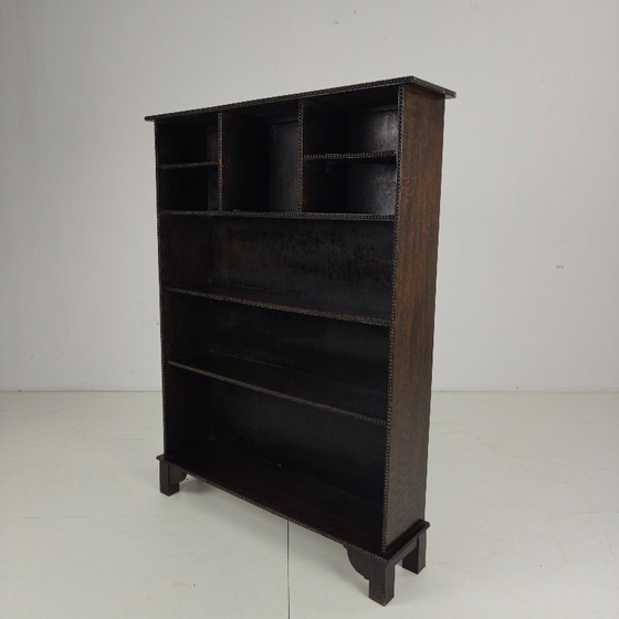 Image 1 of Libreria aperta del XX secolo con motivo a perline