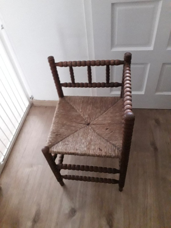 Image 1 of Antica sedia angolare in vimini