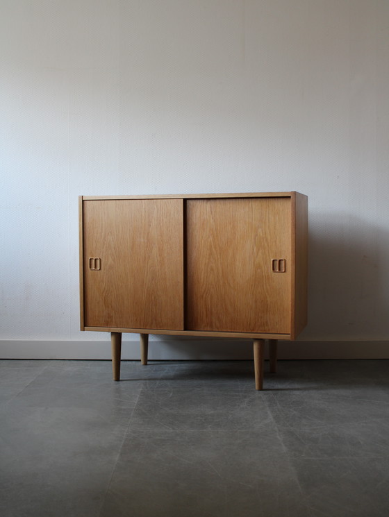 Image 1 of Vintage Danish sliding door cabinet in oak