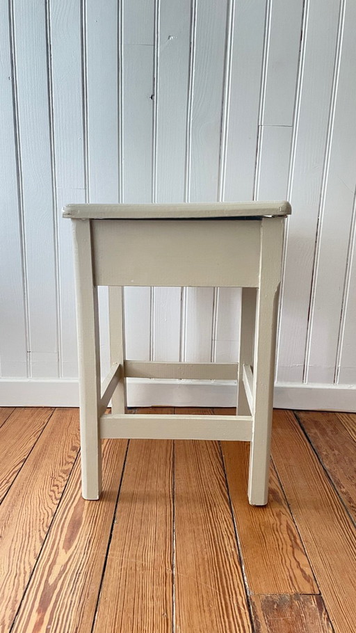 Vintage beige opbergkruk