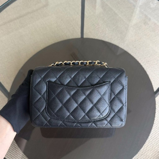 Borsa Chanel Classic Flap Mini - Caviar 20CM trapuntata nera con finiture dorate Serie 20