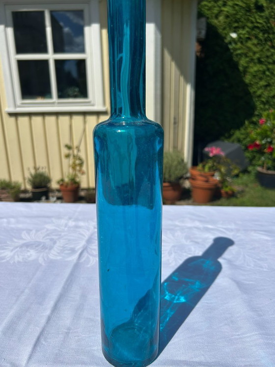 Image 1 of 2 bottles: Apothecary bottle + Elegant turquoise glass bottle, vintage turquoise