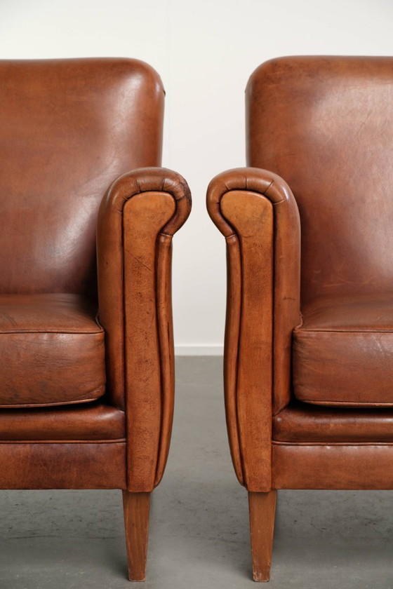 2x Fauteuils en cuir de mouton beaux et confortables avec de belles couleurs et un design intemporel (photo 10 of 14)