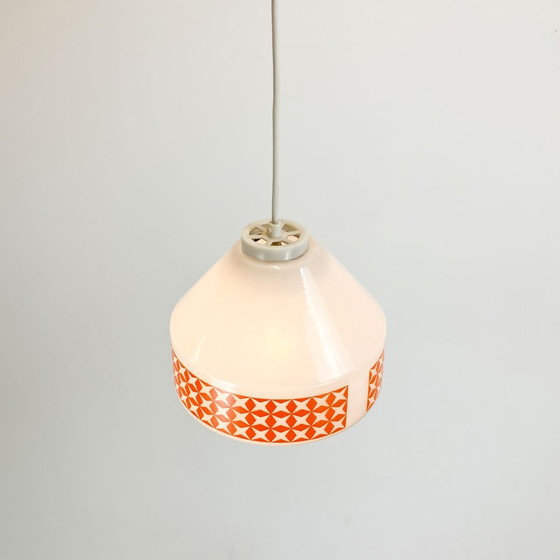 Image 1 of pendant lamp, opal glass with orange pattern, GDR of the 1970s