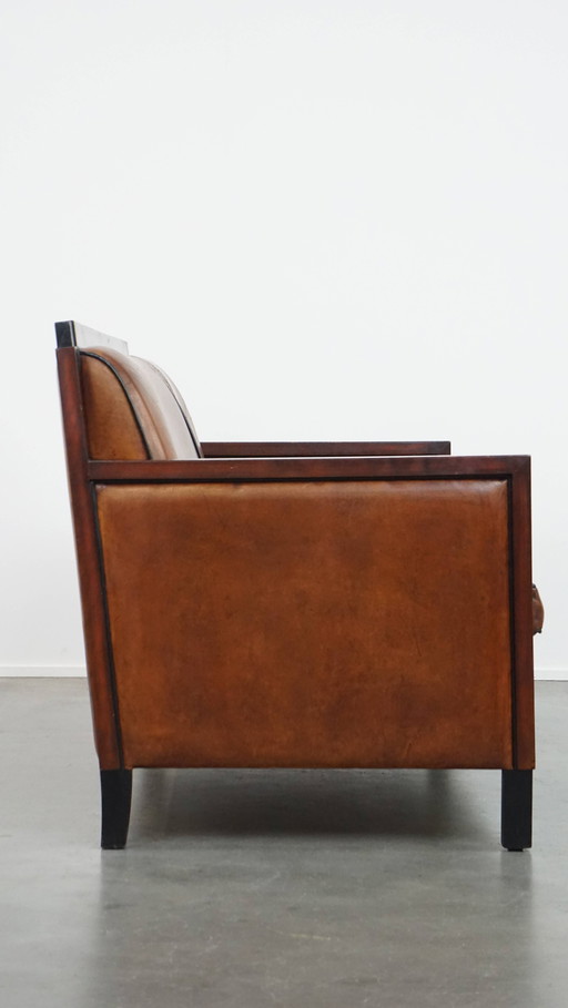 Schapenleren 2-Zits Art Deco Design Bank Met Hout En Zwarte Biezen