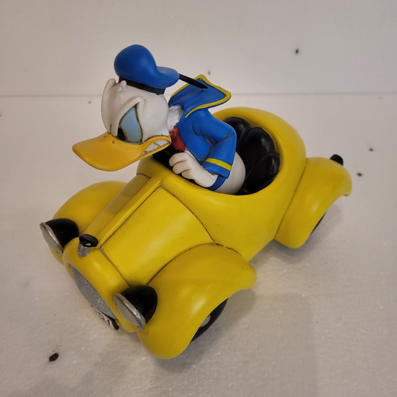 Image 1 of Pato Donald con Coche Amarillo, Rutten, Resina, 2000’s - Estados Unidos