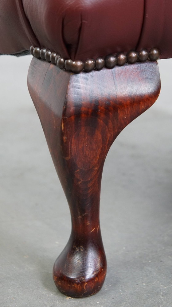 Image 1 of Elegant red/brown Chesterfield stool in very good condition