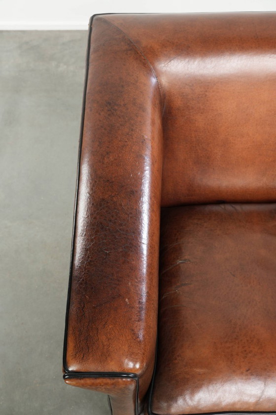 Image 1 of Strakke schapenleren Art Deco design armchair/ fauteuil met zwarte biezen en een prachtige warme kleur