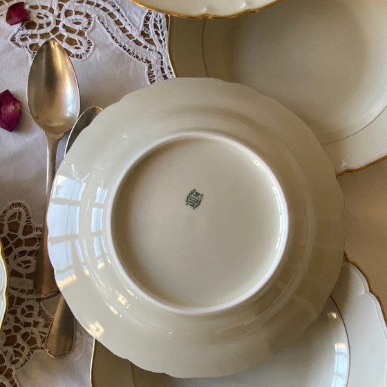 Image 1 of Set of 6 antique off-white porcelain soup plates with gold rim, Limoges ULIM