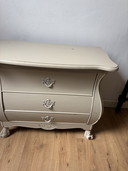 Classic Taupe Dresser With Ornate Shapes