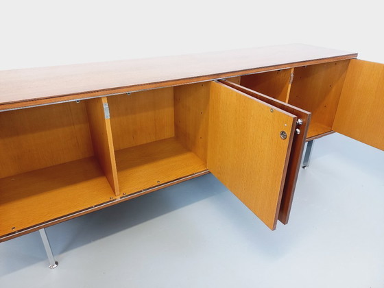 Image 1 of Vintage modern dressoir van palissanderhout en verchroomd metaal uit de jaren 60 en 70.