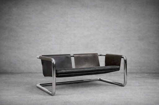 Sofá minimalista Bauhaus vintage de metal tubular y cuero brutalista de los años 50