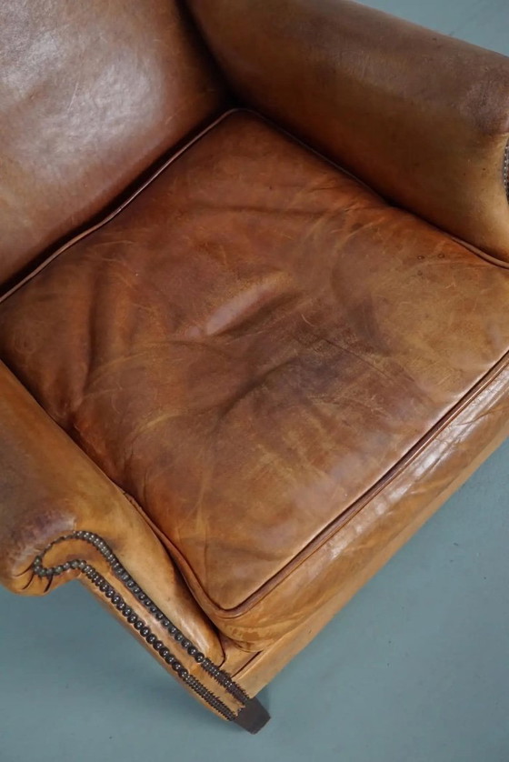 Image 1 of Vintage Nederlandse clubfauteuil van cognackleurig leer