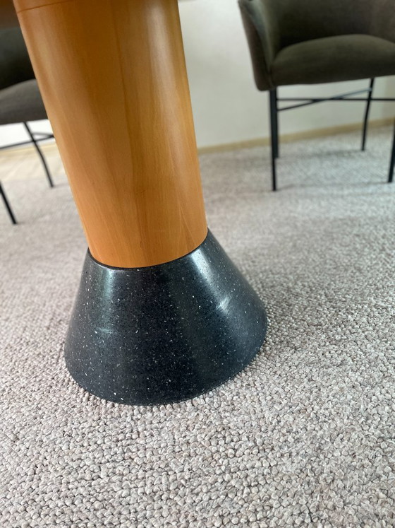 Image 1 of Oval Arco table with granite base