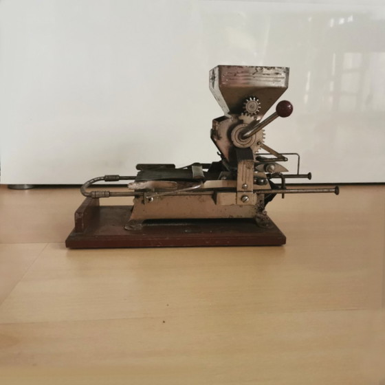 Image 1 of CIGARETTE ROLLING MACHINE AND INSTRUCTIONS FOR USE