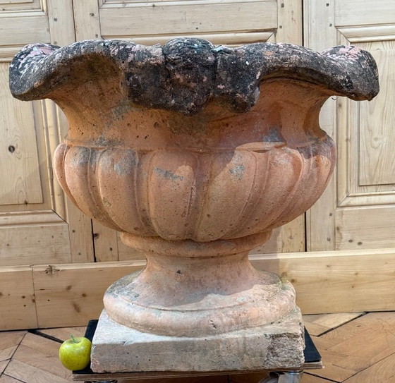 Image 1 of paar terracotta potdeksels