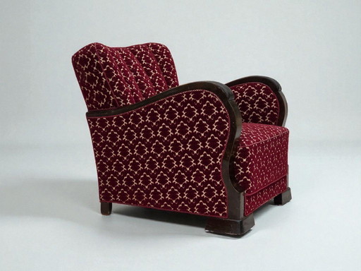 Dänischer Sessel aus den 1960er Jahren, kirschroter Möbelveloursbezug, Eichenholz.