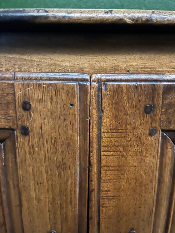 Image 1 of A very small rustic walnut sideboard