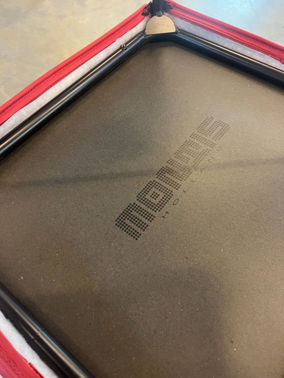 Image 1 of 4 fauteuils Montis Chaplin en cuir rouge avec roulettes pivotantes