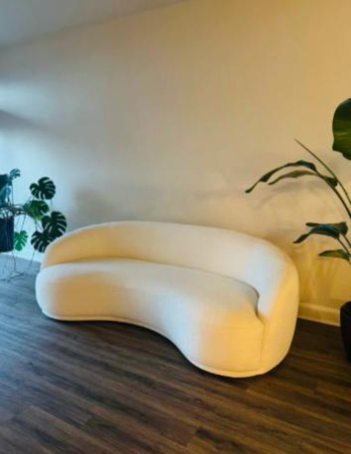 BOUCLE GEBOGENES ELFENBEINCOUCHSOFÀ