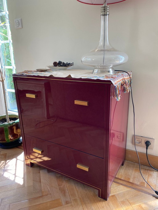 Design furniture set by Pierre Vandel, in burgundy lacquered wood with brass inlays