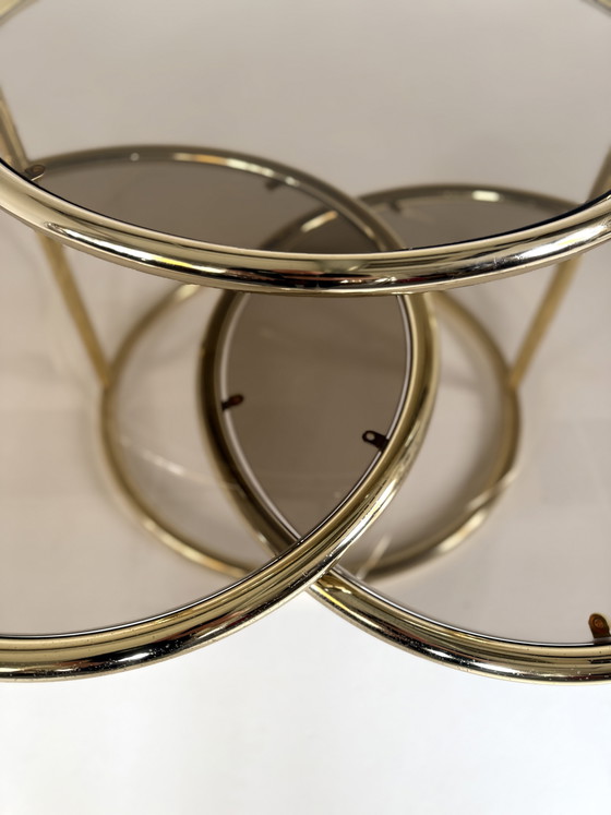 Image 1 of Vintage swivel brass & smoked glass coffee table, 1970s