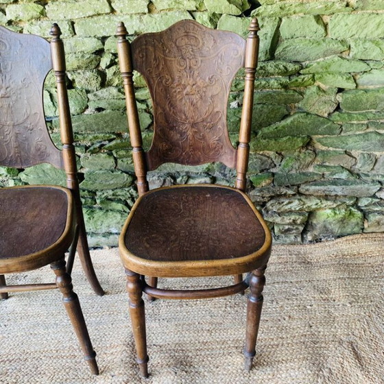 Image 1 of Pair of 2 chairs with relief pattern