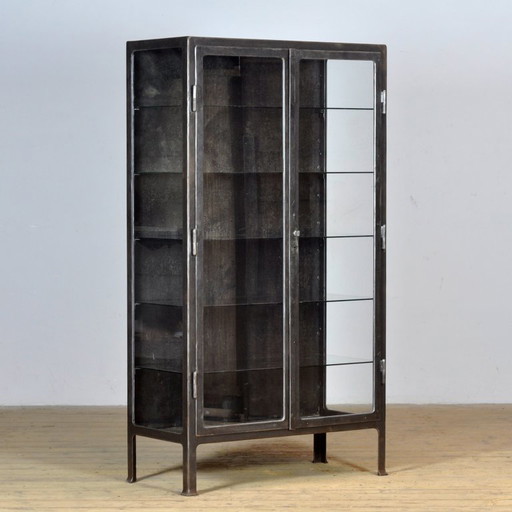 Polished iron medical cabinet, 1930s