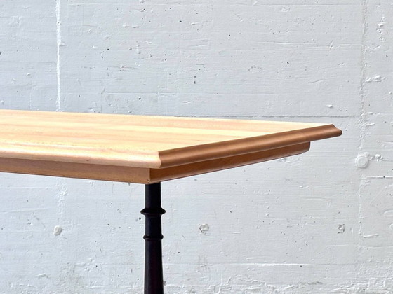 Image 1 of Horgen Glarus baraktafel gemaakt van beukenhout met gietijzeren poten