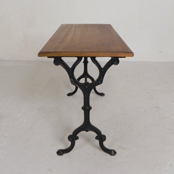 Image 1 of Table de bistrot avec plateau en chêne sur une structure en fonte, années 1930