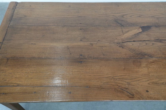 Image 1 of Antique French oak farmhouse dining table for 6 to 8 people with three drawers