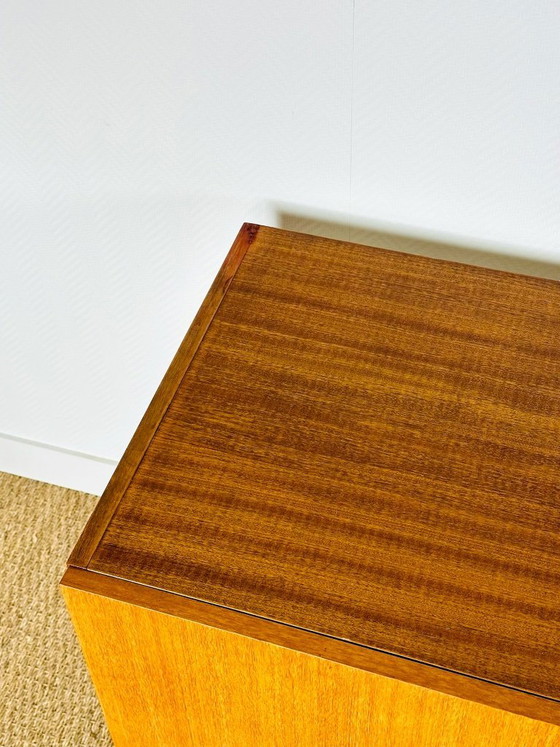 Image 1 of Minimalist Scandinavian sideboard in teak with black metal legs, 1960