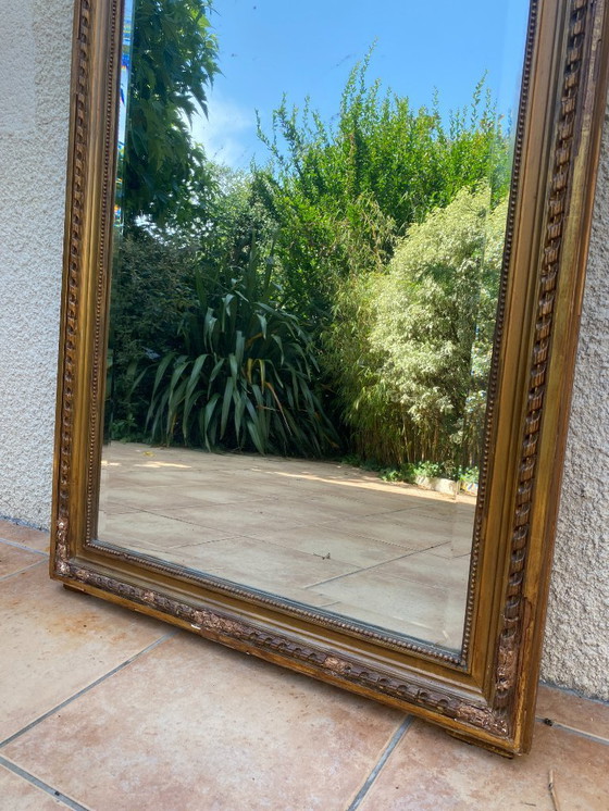 Image 1 of Louis XVI style trumeau mirror in gilded wood with gold leaf, 74x150cm