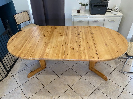 Mesa redonda extensible tipo Baumann de pino macizo, diámetro 106 cm, estilo vintage 1970.