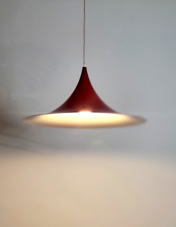 Image 1 of Set of 2 vintage XL semi- or trumpet pendant lamps in deep red