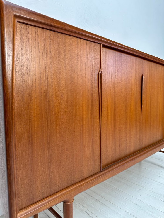 Image 1 of Dänisches Teak-Highboard aus den 1960er Jahren von Axel Christensen für ACO Møbler – Mid-Century-Schrank mit Schiebetüren