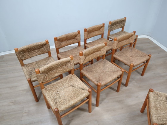 Image 1 of Juego de 8 sillas estilo Charlotte Perriand de los años 60, de paja tejida y madera.