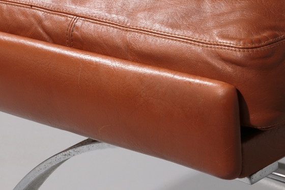 Image 1 of Cognac Leder COR Swing Lounge Stuhl mit Ottomane von Adolf & Schöpfer 1976