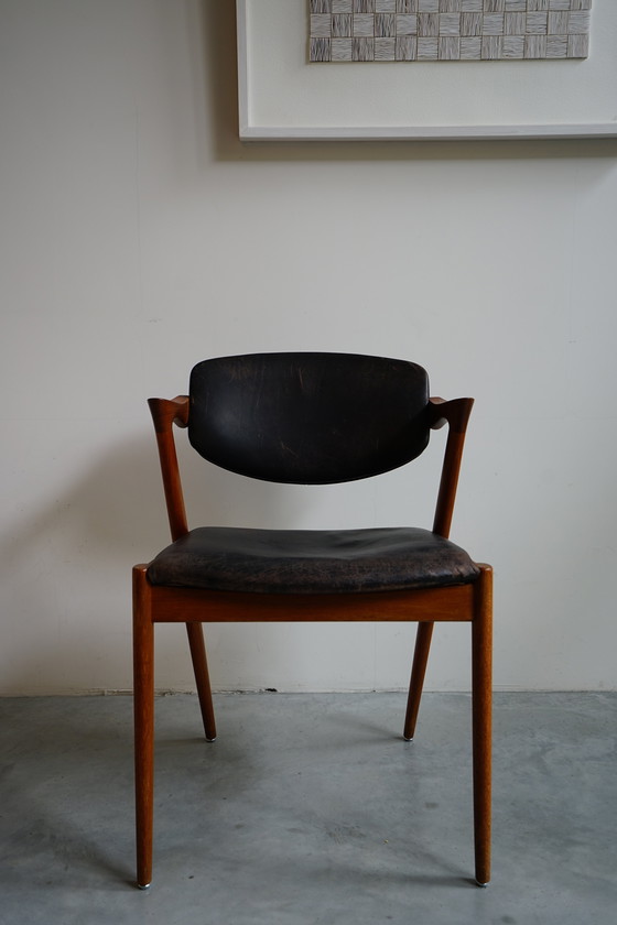 Image 1 of 6 Kai Kristiansen stoelen | Model 42 | Teak Leder patina