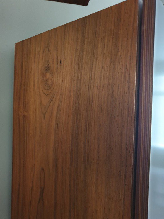 Image 1 of Teak wood cabinet with sliding door, drawers, mirror and light