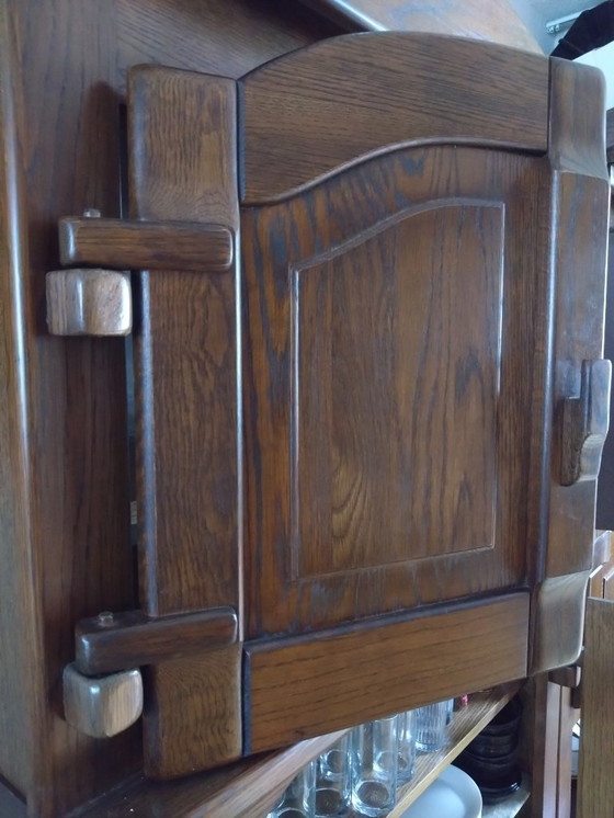 Image 1 of Houten kastenwand met glaskast en klepkast