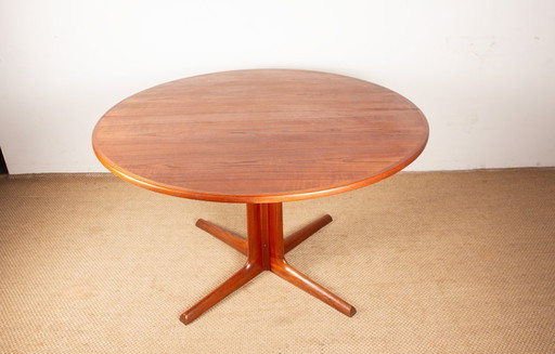 Extendable Danish teak dining table with central pedestal, by Niels Moller 1960.